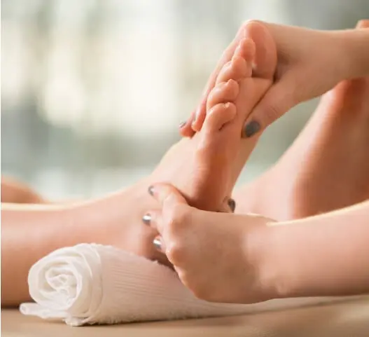 Foot acupressure therapy for stress relief, improved circulation, and relaxation at Messina Acupuncture PC in East Setauket NY