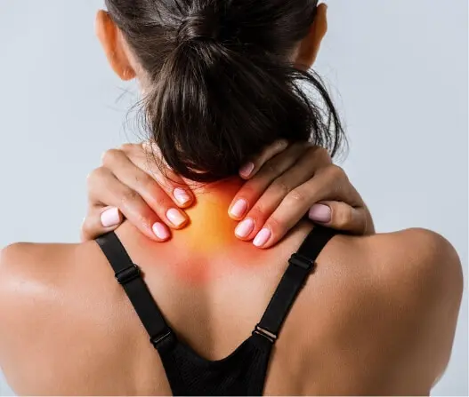 Woman holding her neck in pain with highlighted cervical spine, treatable with acupuncture in East Setauket NY